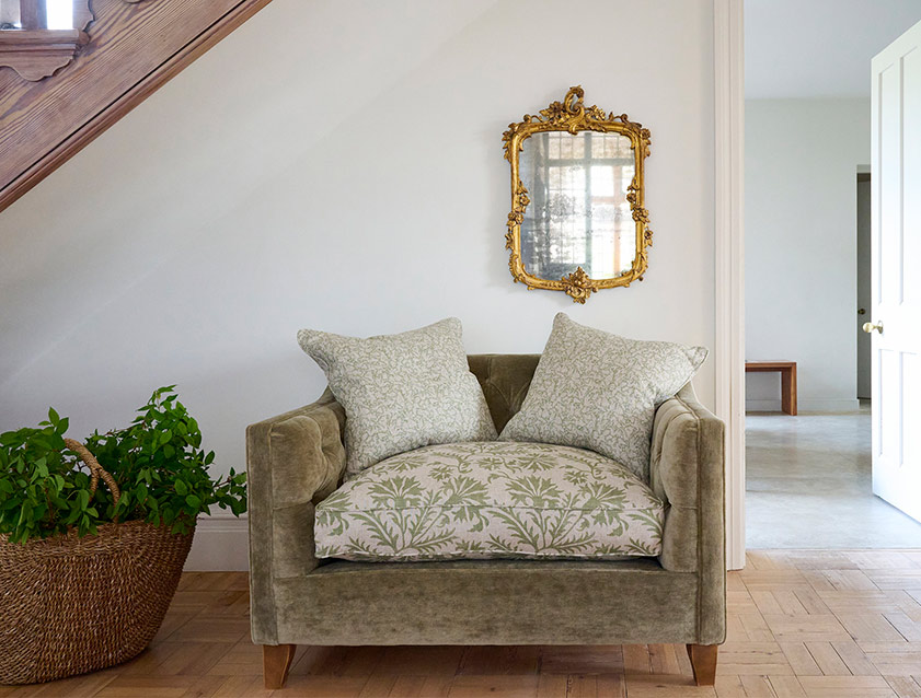 Haresfield Snuggler Dipped Arms in Mohair Lichen Seat Cushion in RHS Gertrude Jekyll Meadow Flower Olive and Scatters in RHS Gertrude Jekyll Folklore Olive